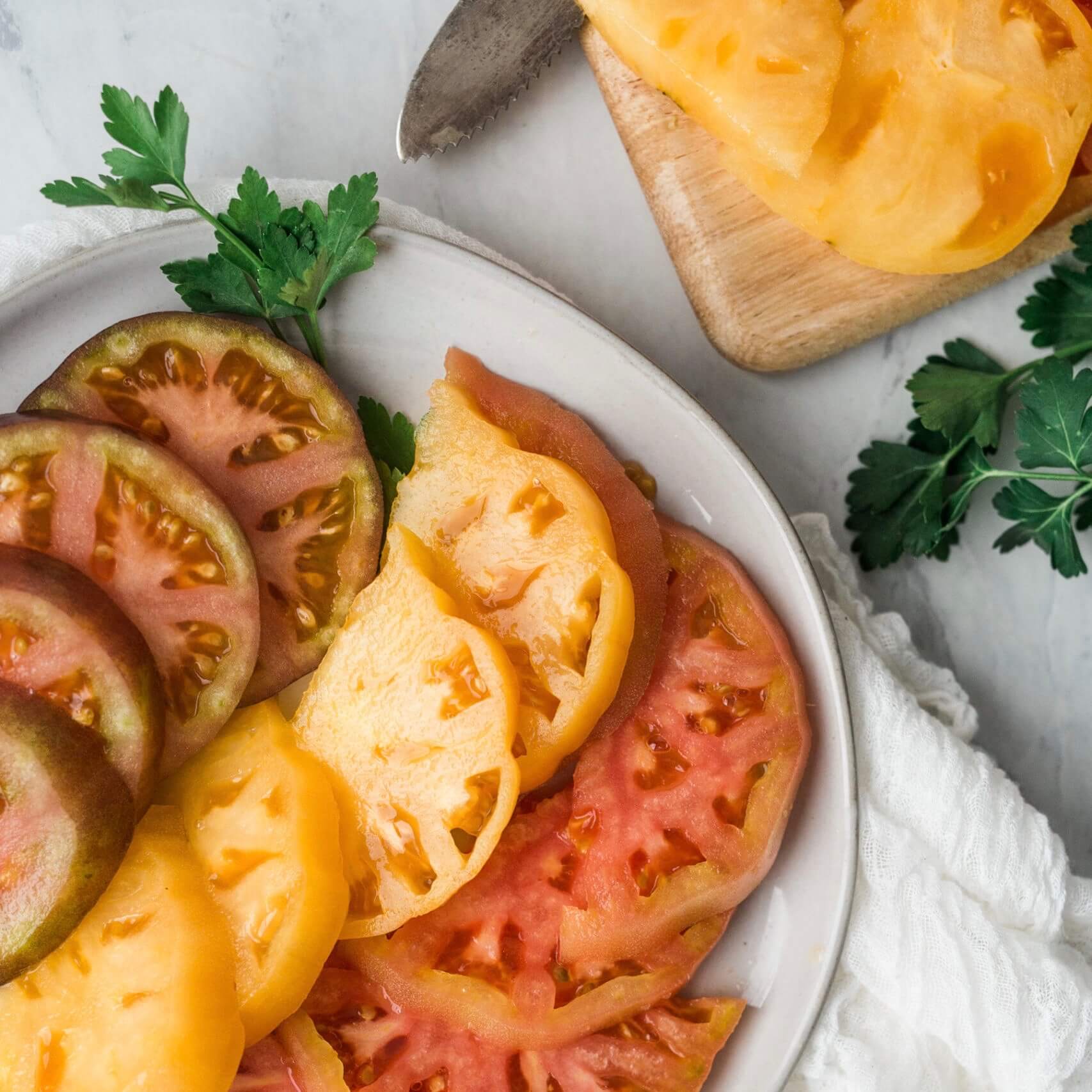 sliced tomatoes on a plate