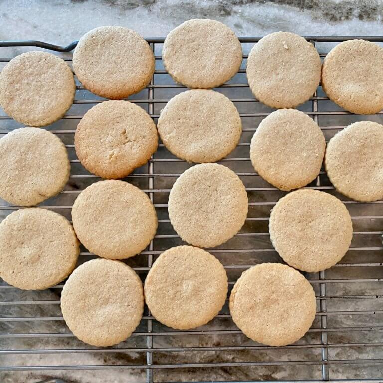 sugar cookies on a cooling rack