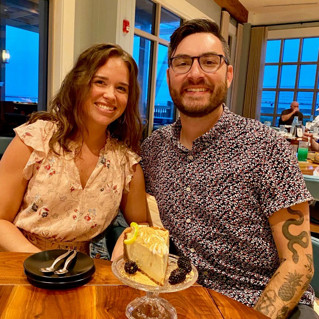 man and woman eating dessert