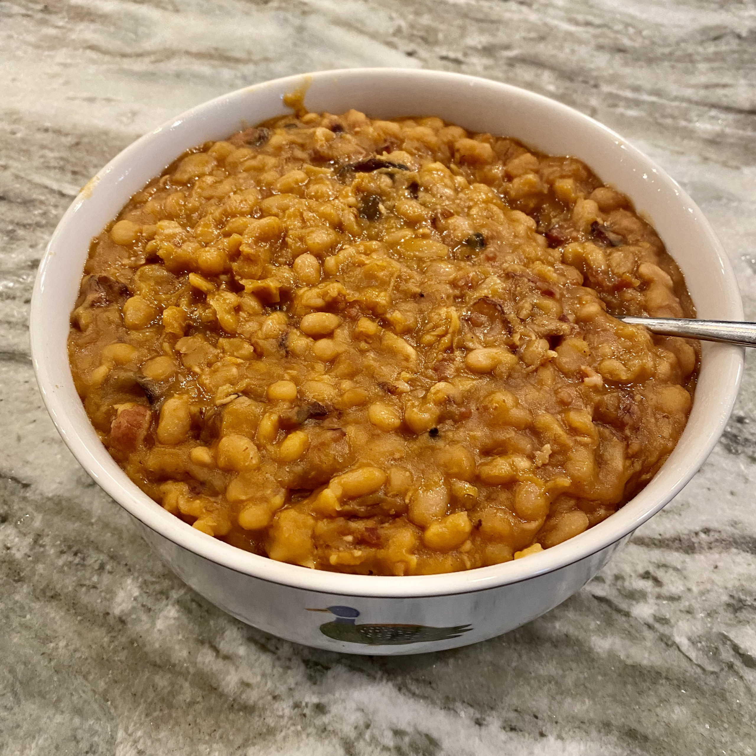 homemade baked beans in a bowl | baked beans recipe | Positively Jane