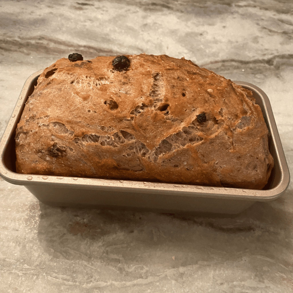 homemade cinnamon bread in the pan | cinnamon raisin bread| positively jane
