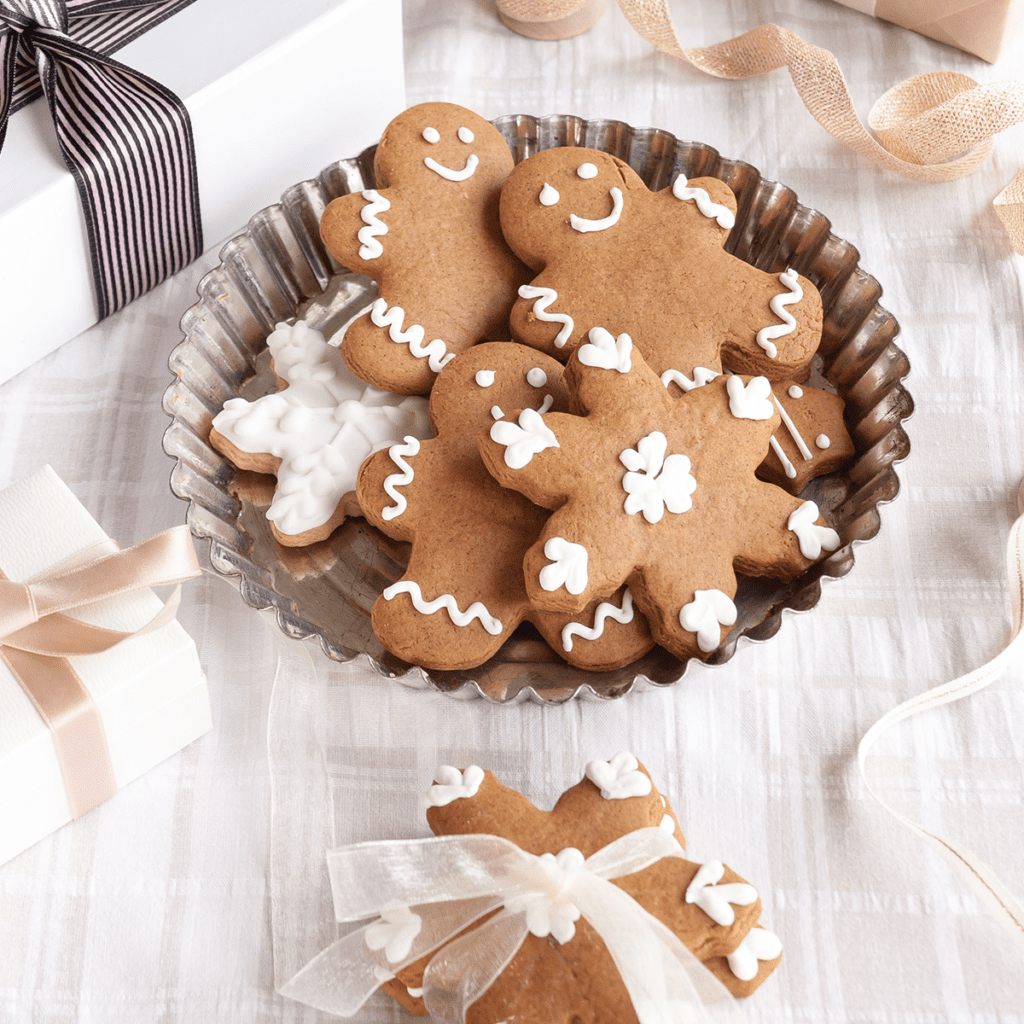 gingerbread cookies with faces on them on a plate