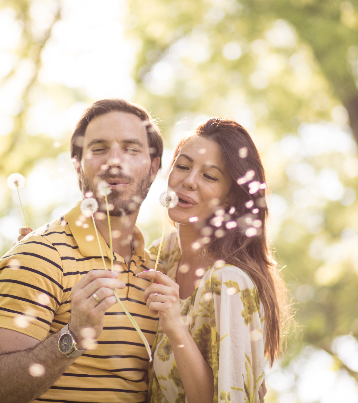 couple blowing bubbles | your finances podcast | positively jane